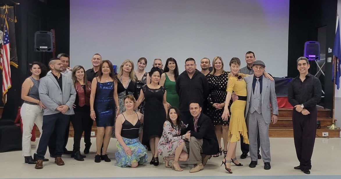 Group photo, stage backdrop, Orlando