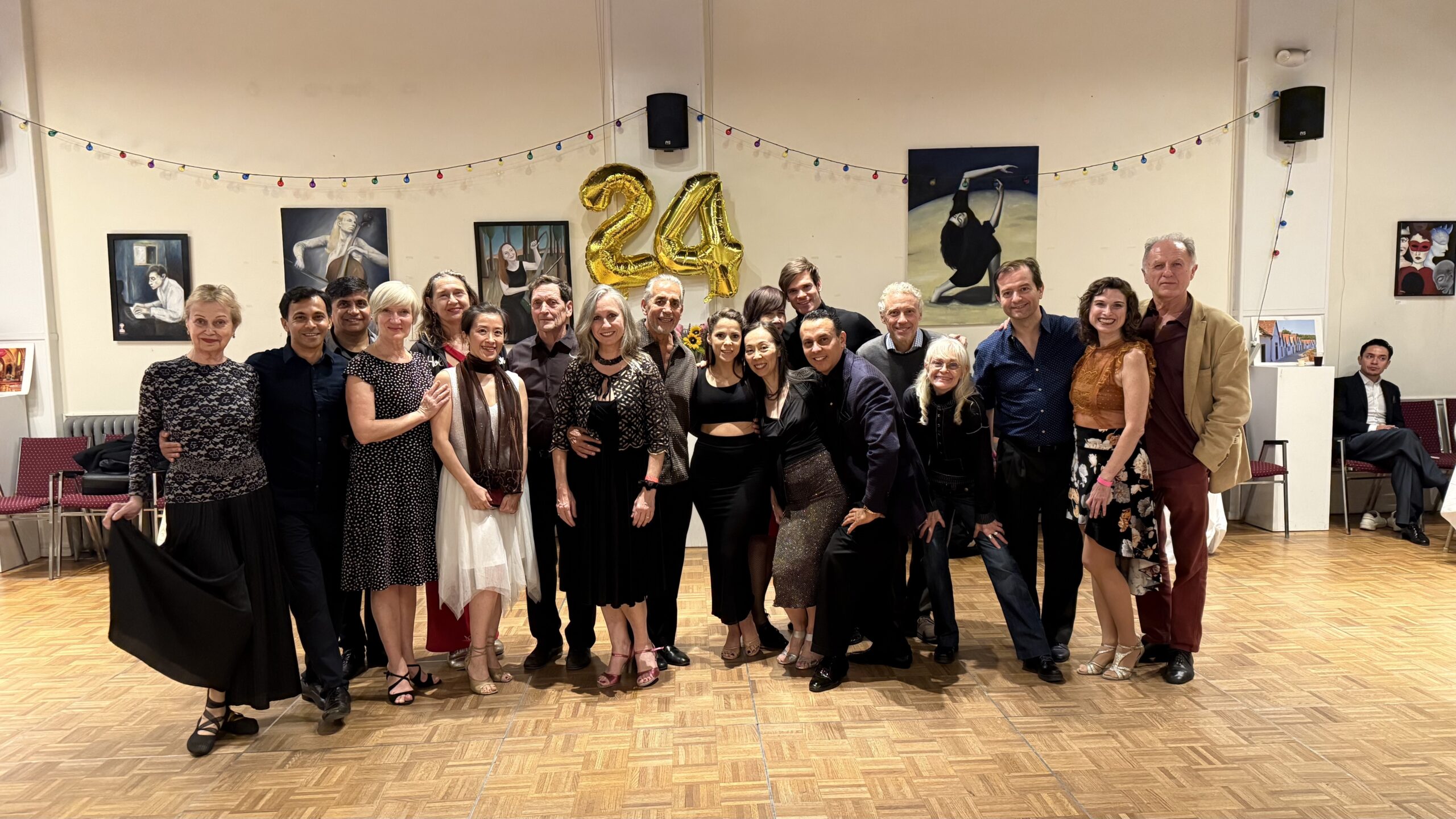 Group photo with gold 24 balloons, NY